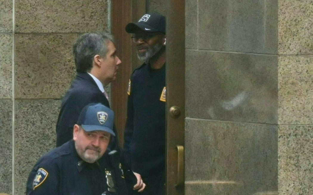 Former Trump attorney Michael Cohen arrives at Manhattan Criminal Court for the trial of former US President Donald Trump for allegedly covering up hush money payments linked to extramarital affairs, 13 May 2024.