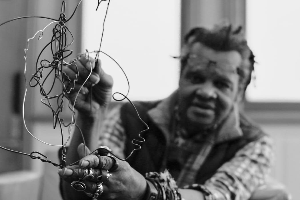 Lonnie Holley and his wire faced sculpture
