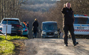 Police and emergency services at the site of a fatal crash in the Esztergom Nyerges Rally, 24 March 2024.