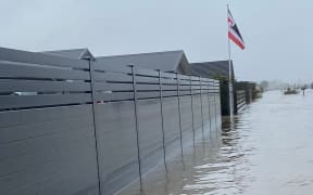 Parts of Whirinaki went underwater during Cyclone Gabrielle and homes on Pohutakawa Drive were badly flooded.