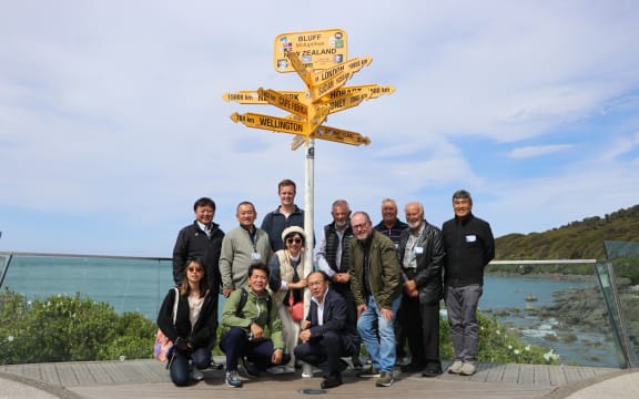A delegation from Kumagaya, Japan, visited Invercargill in 2025. The iconic Kumagaya signpost can be seen at Stirling Point in the port town of Bluff.