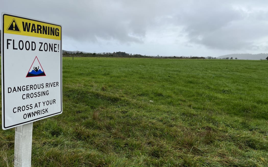 A hazard warning sign on lower Waiho Flat, about 8km below the tourist hotspot of Franz Josef.