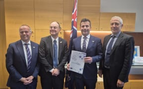 ACT MP Todd Stephenson, Medicines New Zealand CEO Graeme Jarvis, Associate Health Minister David Seymour and Medicines New Zealand board chair Todd Krieble with the white paper in Seymour's office this afternoon.