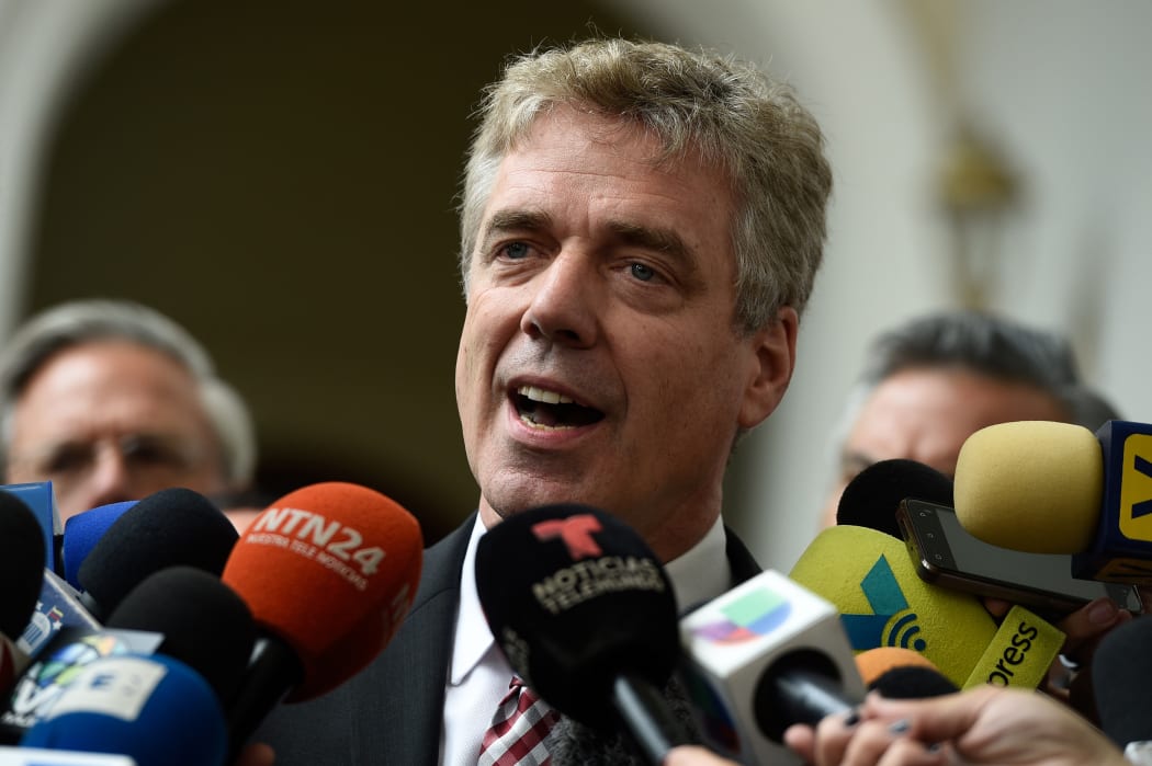 German ambassador to Venezuela Daniel Kriener speaks to journalists after attending a meeting with Venezuela's opposition leader and self-proclaimed acting president Juan Guaido, at the National Assembly in Caracas.