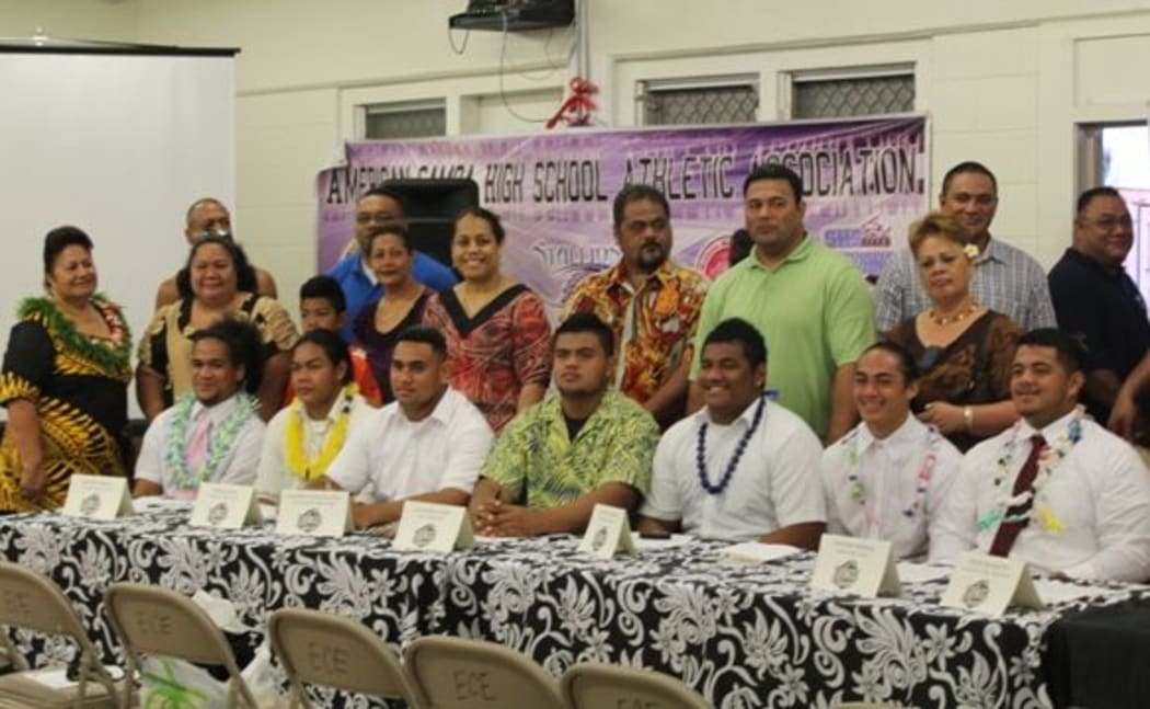 Some of the USA-bound football players from American Samoa, with their parents.