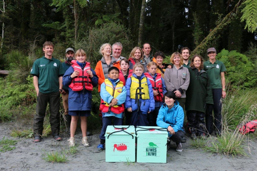 DoC staff and members of the community at the kiwi release.