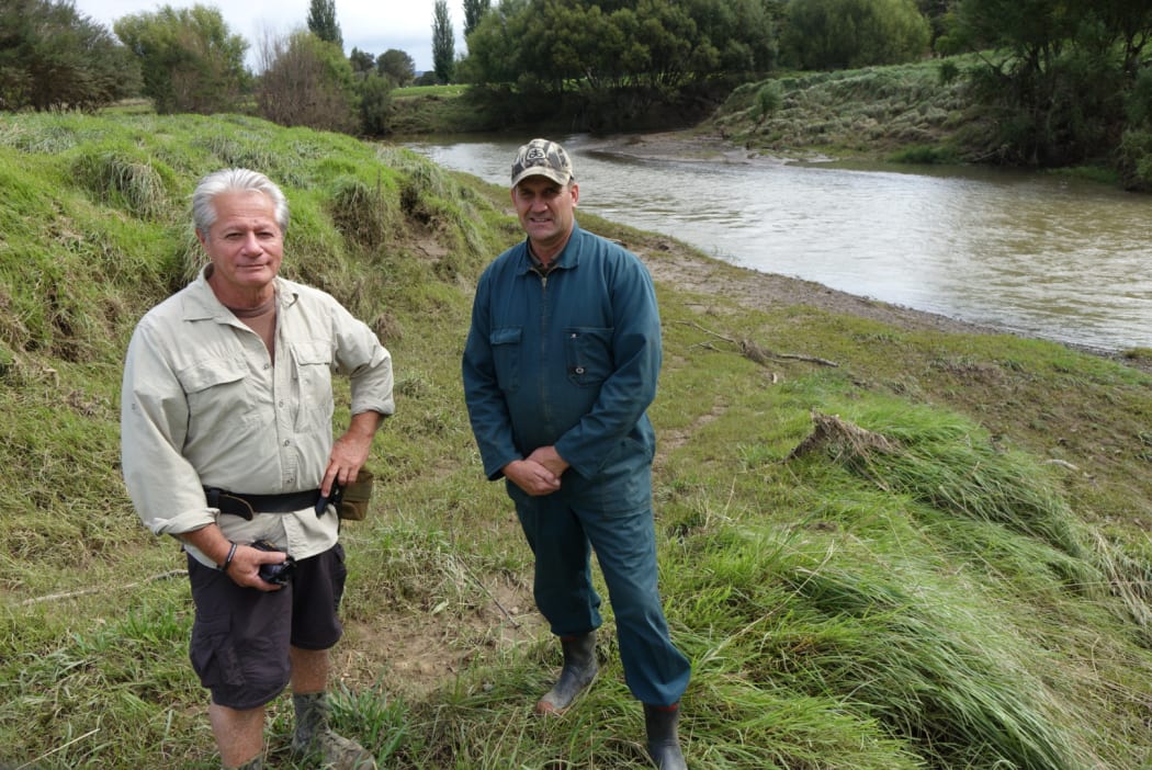 Rover patroller Millan Ruka and Mangakahia Valley farmer Greg Alexander.
