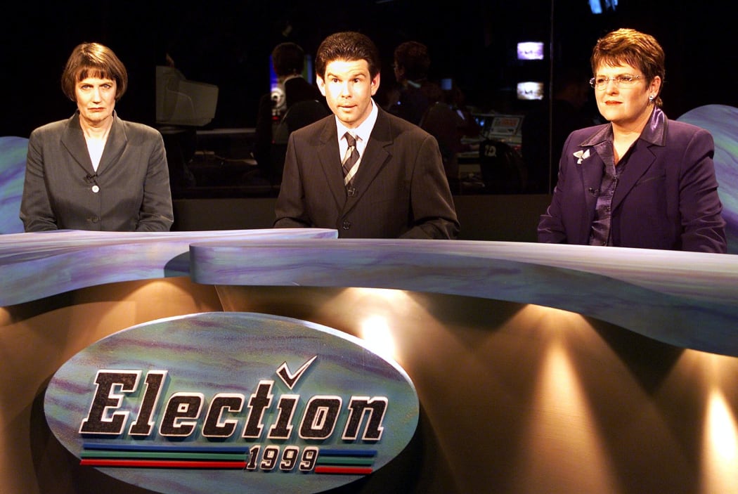 Former PMs Helen Clark (left) and Jenny Shipley in a debate moderated by John Campbell in 1999.