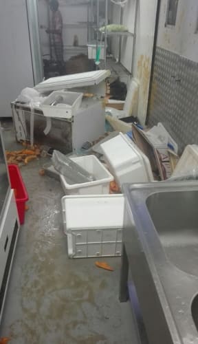 Destruction caused by the brawl in Mike Compound.