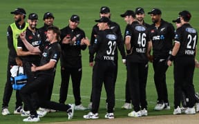 Blair Tickner celebrates as his team mates look on during first ODI vs Sri Lanka, 2023.