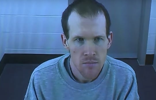 Brenton Tarrant appears on a video link with court.