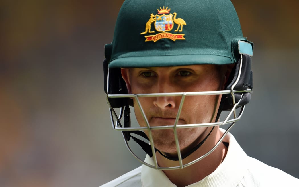 Nic Maddinson walks back to the dressing room folowing his dismissal