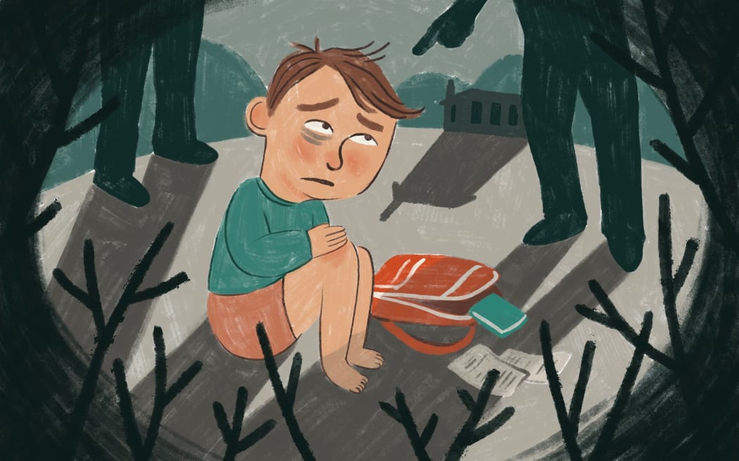 Boy huddled in fear with bully standing over him