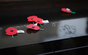 Anzac Day 2023 commemorations in Wellington.
People lay poppies at the conclusion of the dawn service.