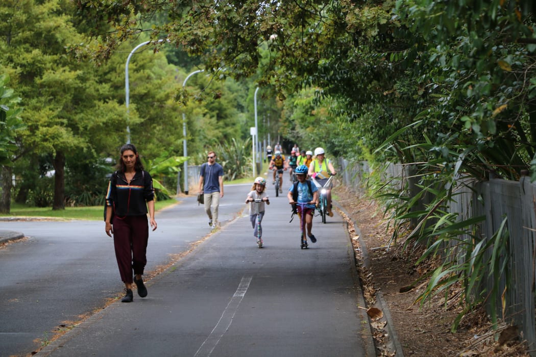 Pedestrians, scooter and bike riders on the northwestern cycleway.