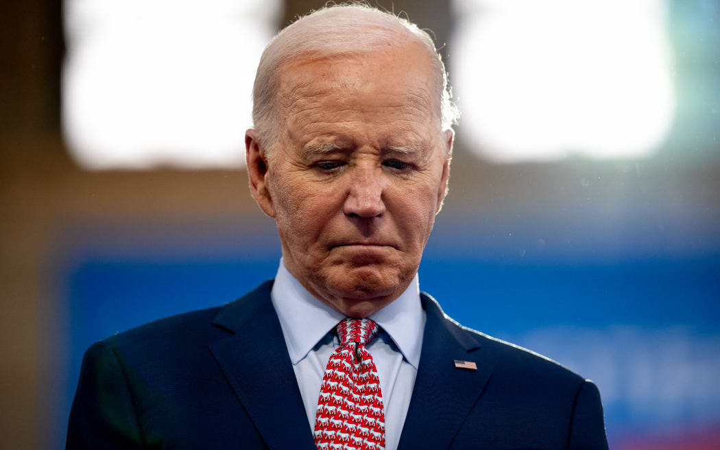 US President Joe Biden stands on stage as US Vice President Kamala Harris introduces him during a campaign rally at Girard College on 29 May, 2024 in Philadelphia, Pennsylvania.