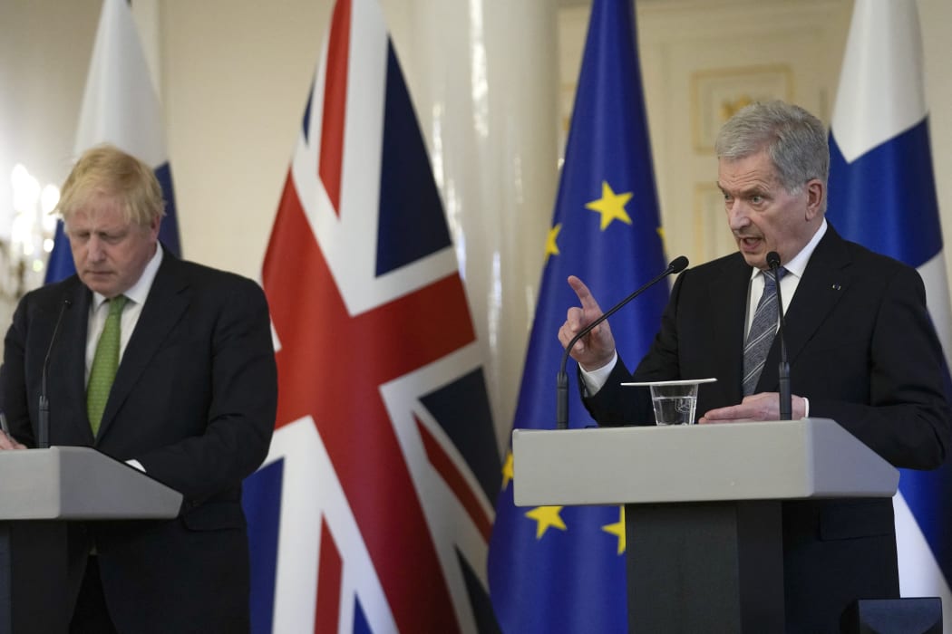 British Prime Minister Boris Johnson and Finnish President Sauli Niinisto address a press conference at the Presidential palace in Helsinki, Finland.