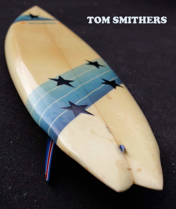 A mint conditions 1970s Tom Smithers twin-fin surfboard is one of those up for auction.