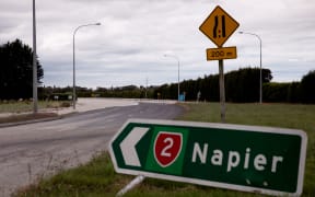 SH2 just south of the closed bridge between Napier and Hastings. Apples are jammed between the cables where the water level used to be.