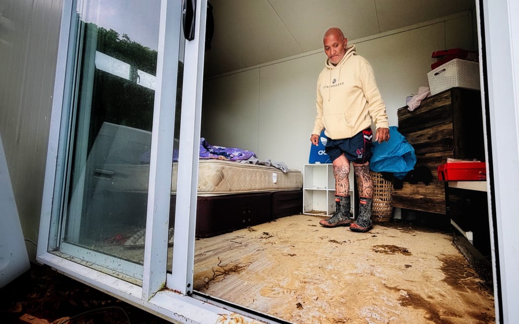 Inside one of the cabins, now caked in mud