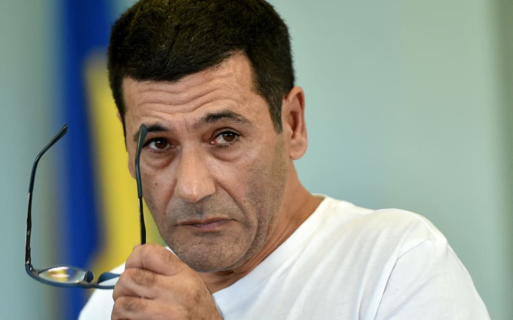 Gilbert Chikli on trial in Kyiv on September 26, 2017.