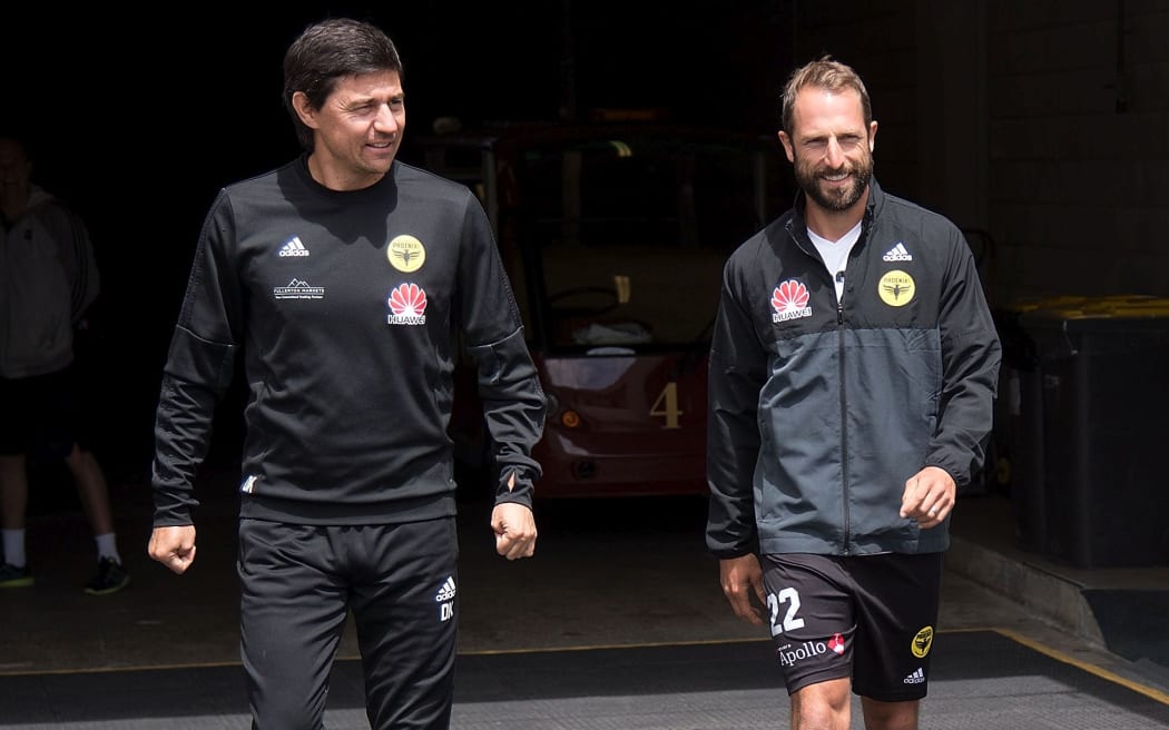 Phoenix captain Andrew Durante, right, walks with head coach Darije Kalezic