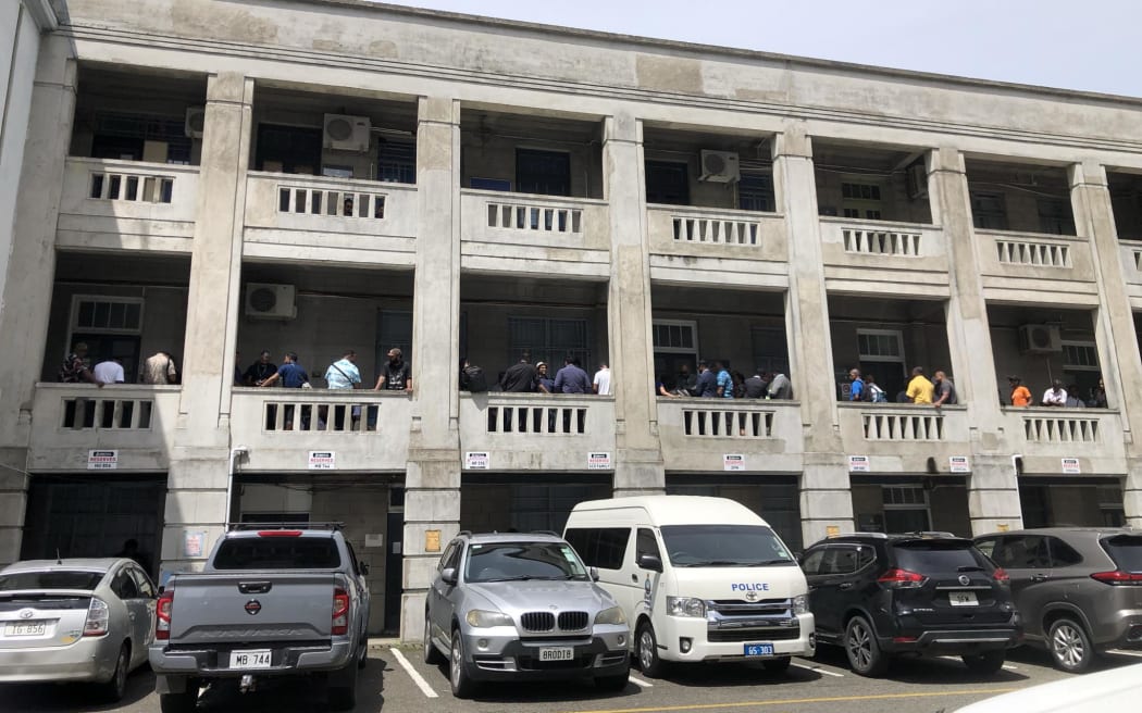 People line up outside Magistrates Court where Bainimarama and Qiliho's sentencing is taking place.