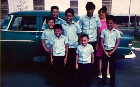 The Filipaina family in front of the family car in Mangere East (Olsen fourth from left).