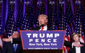 Republican president-elect Donald Trump delivers his acceptance speech during his election night event at the New York Hilton Midtown in the early morning hours of November 9, 2016 in New York City.