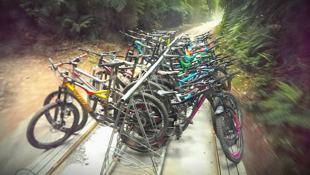 Bikes on tansport trailer from back of van