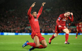 Georginio Wijnaldum of Liverpool celebrates.