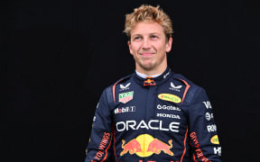 Red Bull Racing's New Zealander driver Liam Lawson poses for a portrait at the Albert Park circuit in Melbourne on March 13, 2025, ahead of the Formula One Australian Grand Prix. (Photo by WILLIAM WEST / AFP) / --IMAGE RESTRICTED TO EDITORIAL USE - STRICTLY NO COMMERCIAL USE—