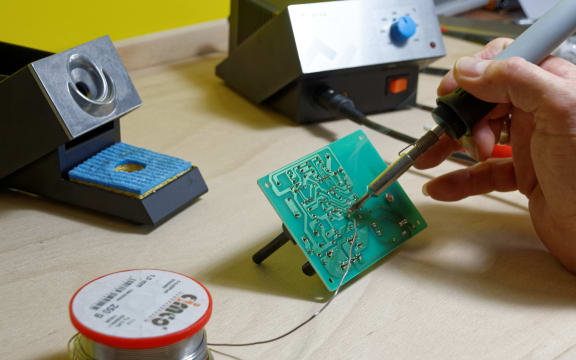 Soldering iron in use