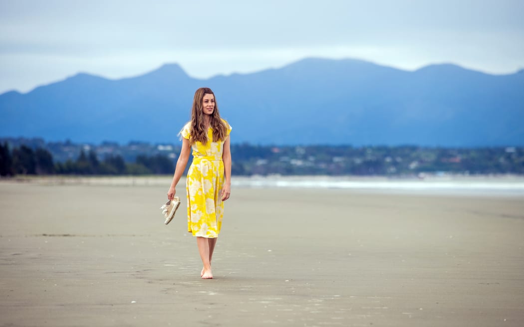 Picture by Tim Cuff 10 November 2020 - Writer Rebekah Ballagh, at home with daughter Mikah, and pug Jet in Brightwater, and on the beach at Rabbit Island, Nelson, New Zealand.