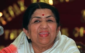 (FILES) In this file photo taken on April 28, 1999 singer Lata Mangeshkar answers questions at a press conference in Mumbai.