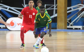 Solomon Islands captain Elliot Ragomo surveys his options.