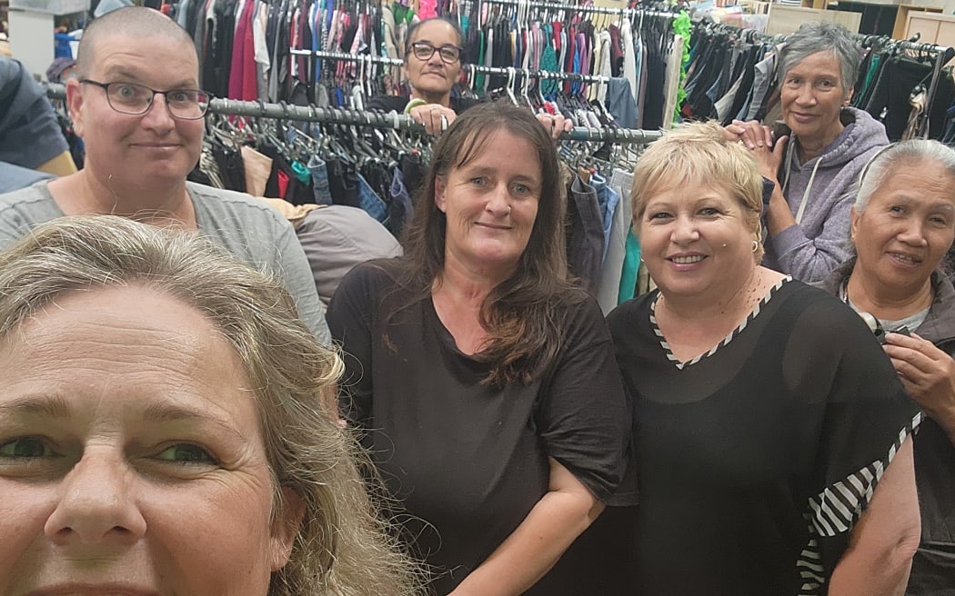 Dee Glentworth (bottom left) and her team of volunteers and workers at Free For All in Porirua.