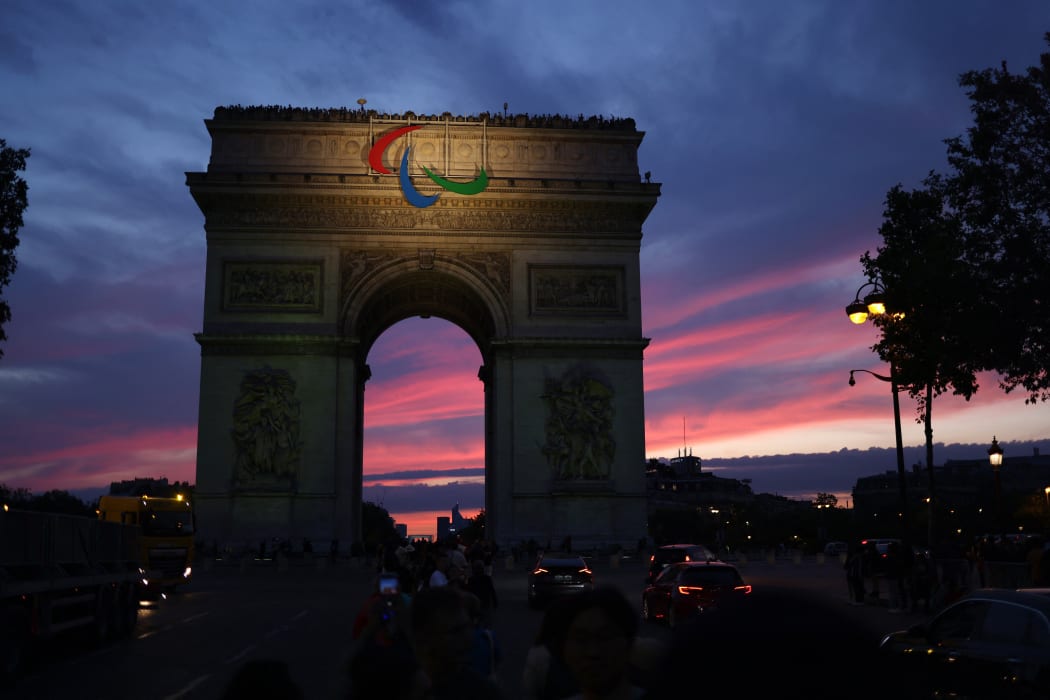 The sunset in Paris tints the sky in a rosy flush on July 27, 2024, after the rain has stopped since the day of the opening ceremony for the Paris Olympics. ( The Yomiuri Shimbun ) (Photo by Kunihiko Miura / Yomiuri / The Yomiuri Shimbun via AFP)