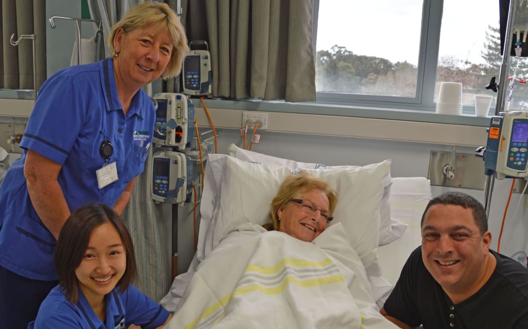 Vivian Armstrong, the first Waikato patient to receive a new drug to treat advanced melanoma, Opdivo, at Waikato Hospital recently. With her are nurses Nancy Yang (front) with Joy Utting and Vivian Armstrong's son Deen.