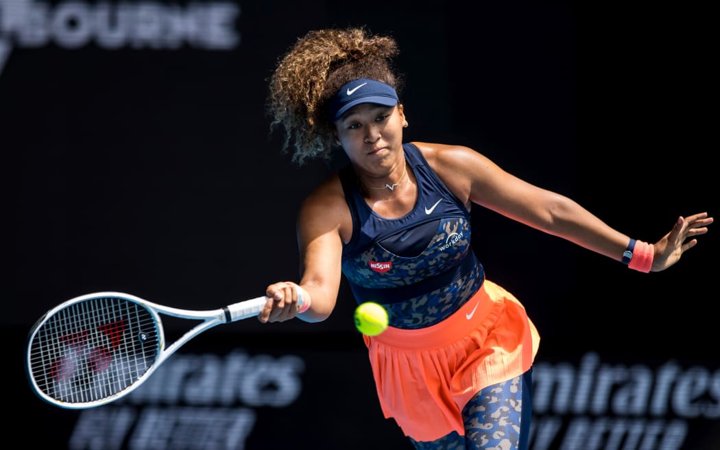 Naomi Osaka of Japan returns the ball during the quarterfinals of the 2021 Australian Open on February 16 2021, at Melbourne Park in Melbourne, Australia.