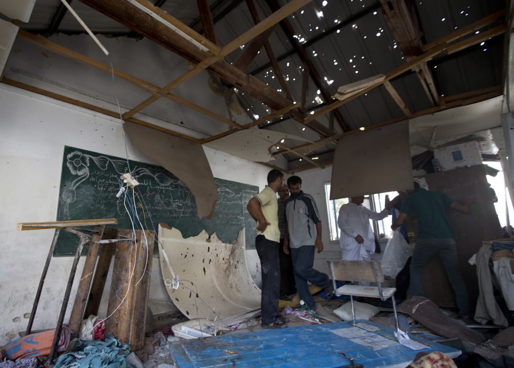 The US and UN condemned the shelling of the UN-run school in Jabaliya district.
