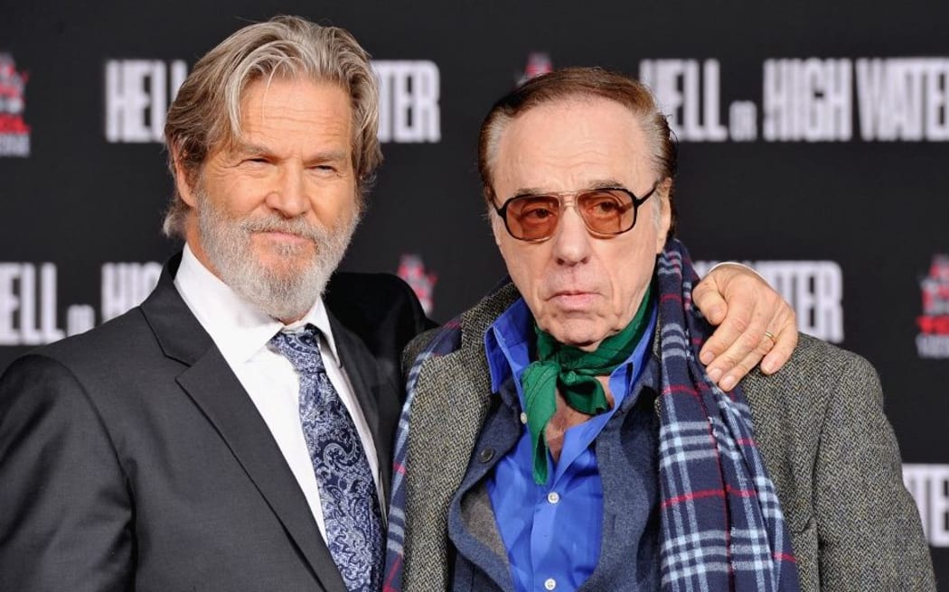 LOS ANGELES, CA - JANUARY 06: (L-R) Actor Jeff Bridges and Director Peter Bogdanovich attend Jeff Bridges' hand and footprints ceremony at TCL Chinese Theater on January 6, 2017 in Los Angeles, California.