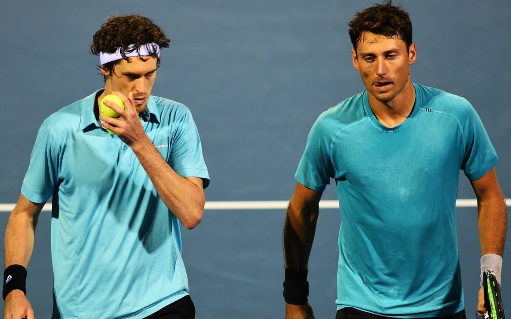Marcus Daniel (left) and Artem Sitak.