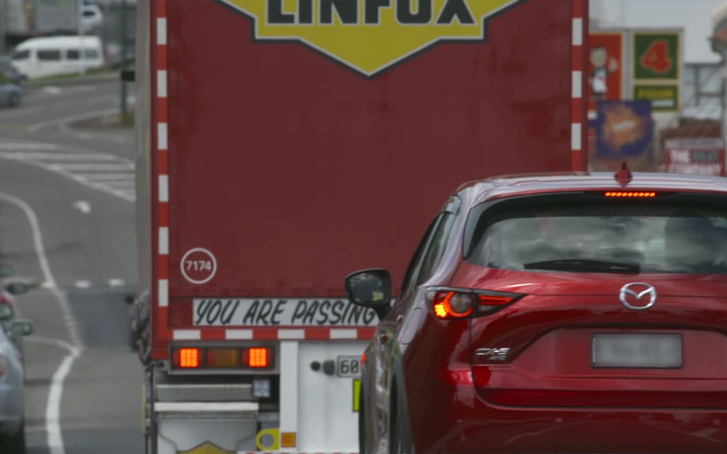 Truck and traffic in Wellsford.