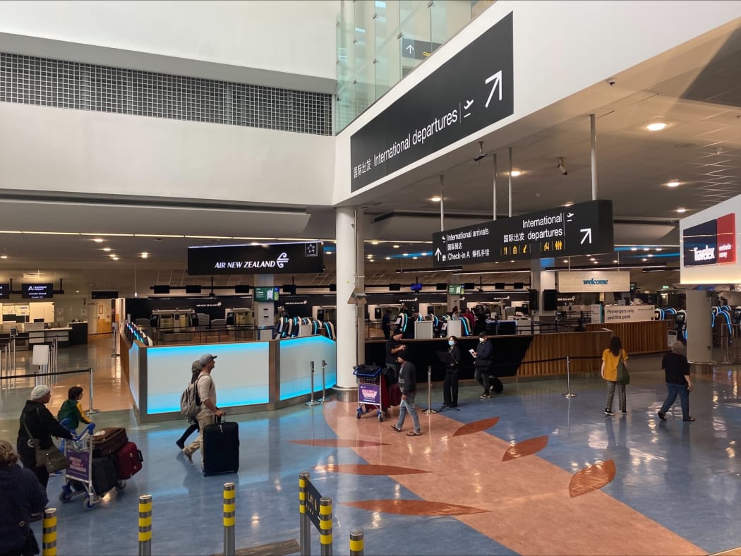 Passengers head to departures at Auckland Airport on the day the trans-Tasman bubble opened, 19 April 2021.