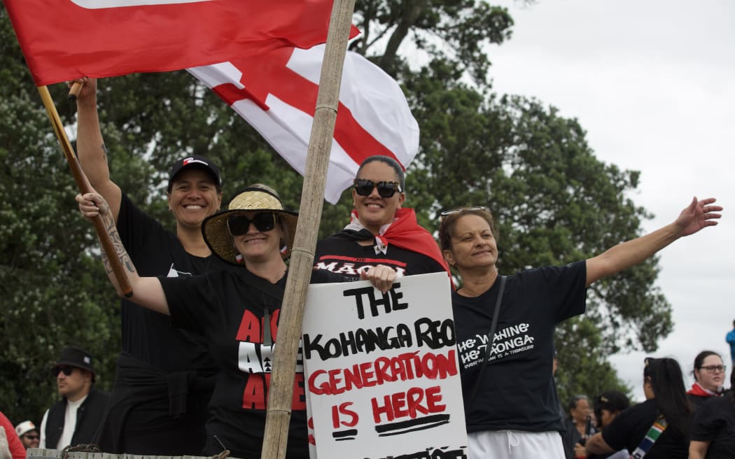 Jenz Snowden and her friends at the hīkoi in Ihumātao.