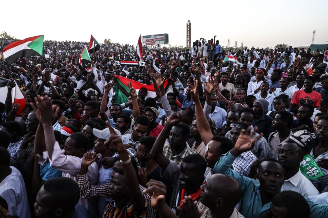 KHARTOUM, SUDAN - APRIL 21: Sudanese demonstrators gather in front of military headquarters during a demonstration after The Sudanese Professionals Association's (SPA) call, demanding a civilian transition government, in Khartoum, Sudan on April 21, 2019.