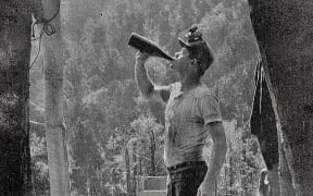 West Coast Miner drinking from bottle
