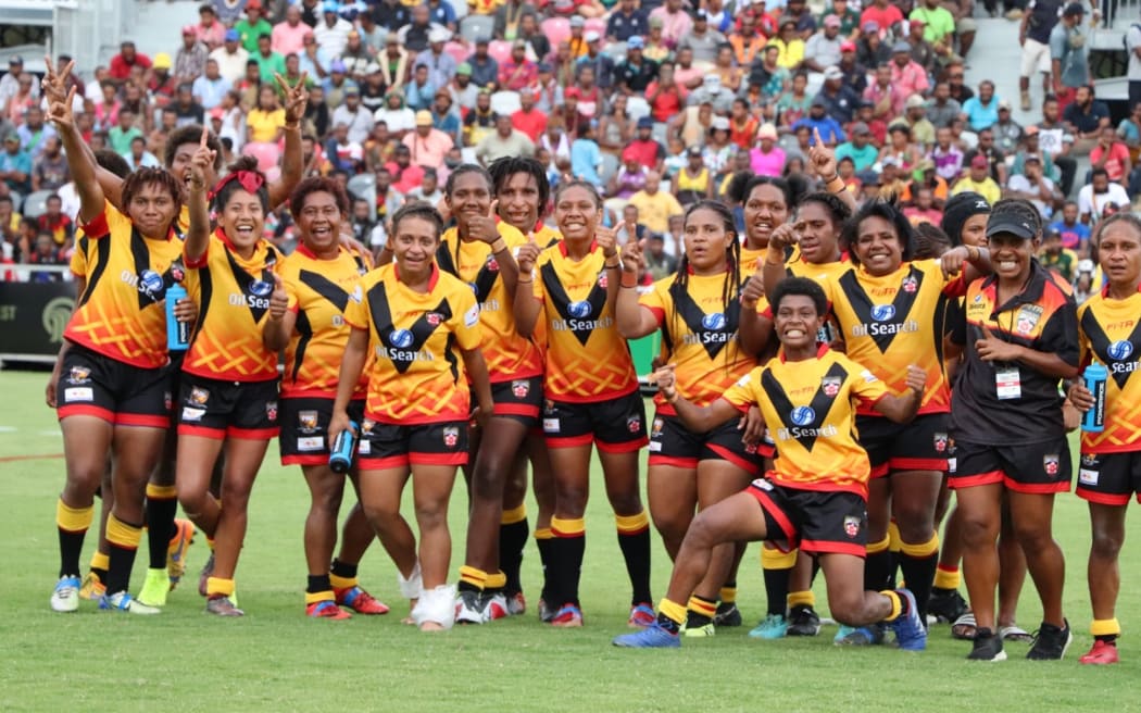 The PNG Orchids celebrate their first ever test match win against England.