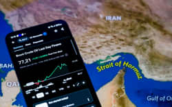 The Brent crude oil price chart from the past week is displayed on a mobile screen in this photo illustration, as prices fluctuate amid escalating conflict involving Iran and concerns over global supply disruptions in Brussels, Belgium, on March 2, 2026.